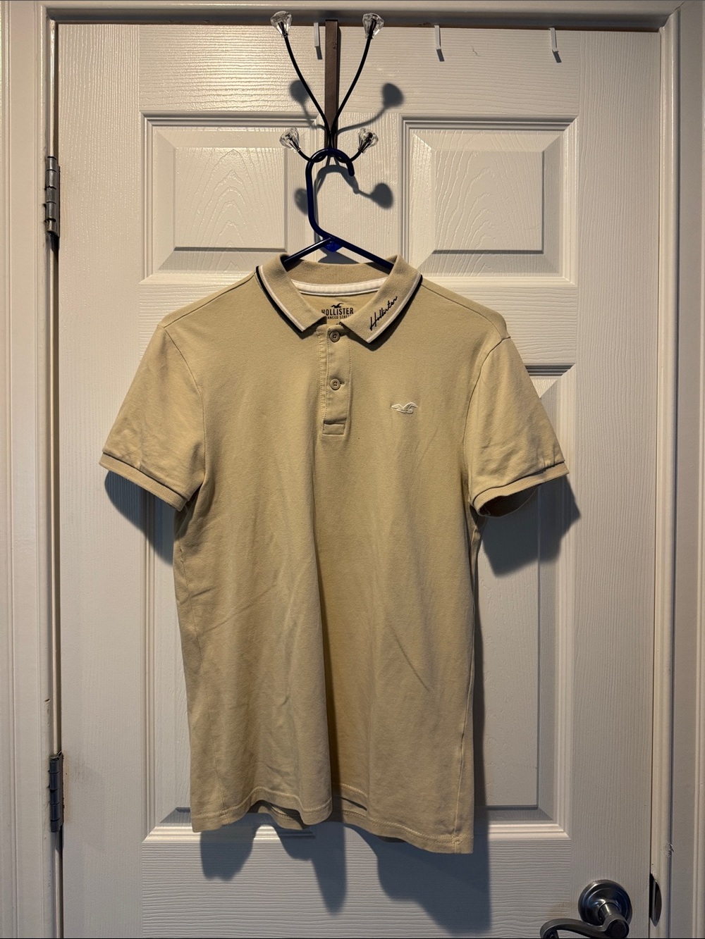Hollister Men's Polo in Light Beige with Contrast Black Tipping